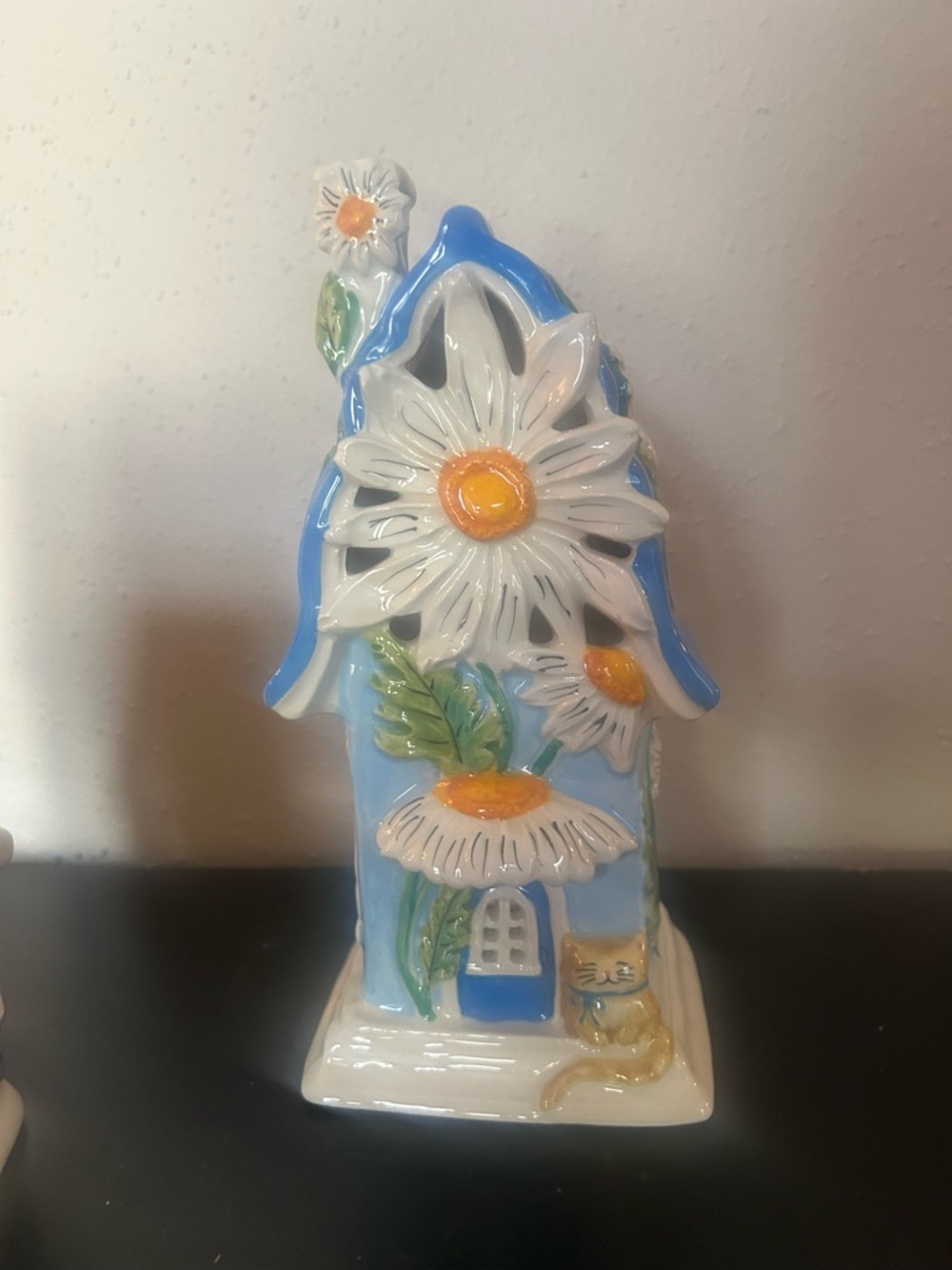 Blue Sky Ceramic Daisy House Figurine in Blue, White, Yellow, Green